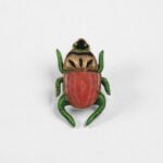 Metallic Green Legs / Cherry stone