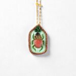 Metallic Green Legs / Cherry stone